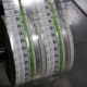 Large spool of labels being printed at a high rate