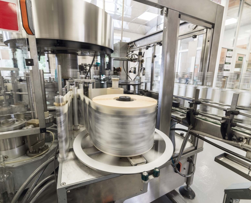 Automatic labeling machine during operation_