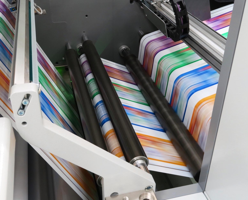 Image of an industrial printer printing labels.